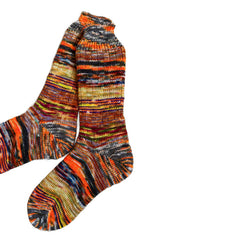 Scrappy wool socks in vibrant colors, perfect for winter.