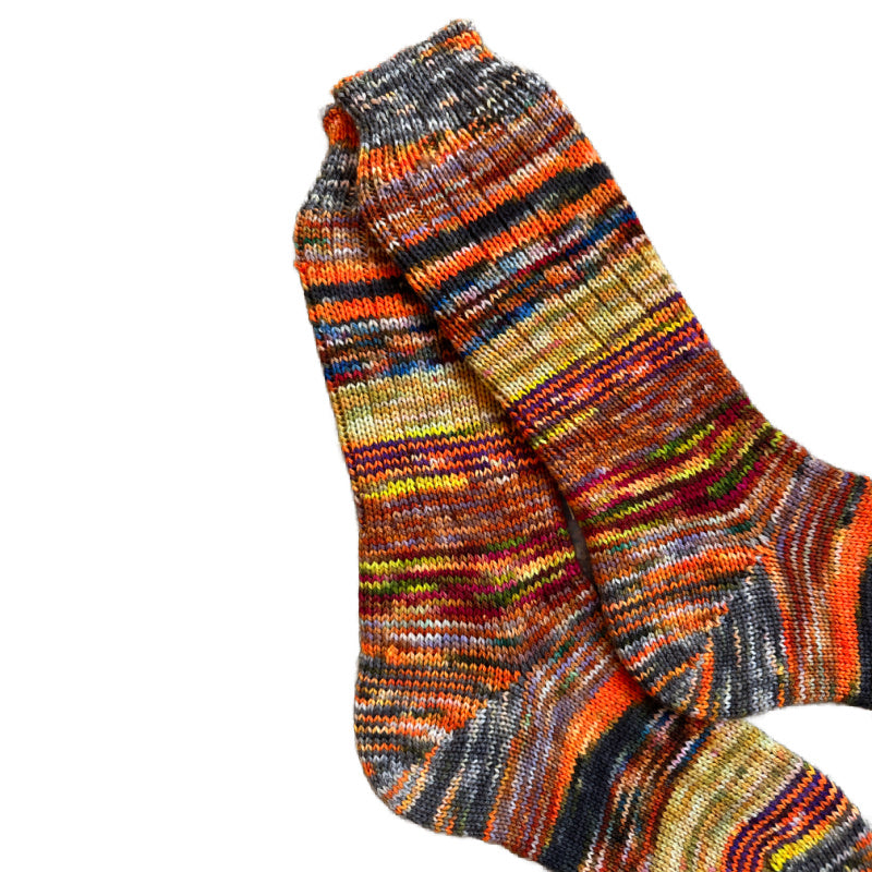 Scrappy wool socks in vibrant colors, perfect for winter.